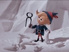 there is a figurine with a bird and a wrench in the snow