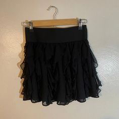 Brand New Express Tulle Ruffle Layered Skirt Brand New With Tags!!!!! Gorgeous Skirt! Tulle Material Tiered Scalloped Ruffles Features Thick Elastic Band Waist Lightweight Material So The Skirt Is Very Comfortable! Express Design Studio Size Medium Reminds Me Of A Twirl Orseund Iris Skirt Retail $50 Color Black Will Go With Everything! A Must Have For Your Closet! Orseund Iris, Black Ruffle Skirt, Brown Pencil Skirt, Skirt With Ruffles, Skirt Tulle, Leather Pleated Skirt, Tiered Mini Skirt, Twirl Skirt, Grey Pencil Skirt