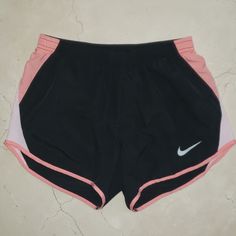 This Is A Brand New Pair Of Shorts By Nike Dri Fit. Beautiful Black And Light Pink Color Combination. Inner Drawstring Waistband For The Perfect Fit. These Will Become Your Go-To Shorts For Everyday. Made Of A Lightweight, Moisture-Wicking Fabric. So Comfortable, Classic, And Easy To Wear. "Underwear" Lining For Full Support And Coverage. Brand New In Perfect Condition. Purchased For $35+Tax. Buy It Here For A Fraction Of The Price I Paid. Please Let Me Know If You Have Any Questions! I Am Selli Nike Black Athletic Shorts For Running, Sporty Pink Jogging Bottoms, Casual Pink Sports Shorts, Sporty Pink Moisture-wicking Athletic Shorts, Pink Athletic Shorts For Gym With Elastic Waistband, Pink Sports Shorts With Elastic Waistband, Pink Athletic Shorts With Elastic Waistband For Gym, Pink Athletic Shorts With Elastic Waistband For Sports, Pink Training Bottoms With Elastic Waistband