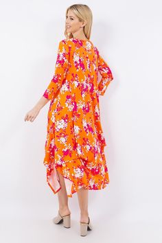 Elevate your style with the Pick-Up Hem Asymmetric Floral Midi Dress. This eye-catching dress features a round neckline, half sleeves, a unique pick-up hem and beautiful floral print, perfect for any occasion. Its modern asymmetric silhouette adds a stylish touch, while you embrace your confidence. Pair with your favorite accessories for a chic and elegant look. Features: Pocketed Sheer: Opaque Stretch: Slightly stretchy Body: Not lined Material composition: 92% polyester, 8% spandex Made in USA Orange Half Sleeve Summer Dress, Spring Floral Print Maxi Dress With Asymmetrical Hem, Spring Floral Print High-low Hem Maxi Dress, Spring Floral Print Maxi Dress With High-low Hem, Spring High-low Hem Floral Maxi Dress, Printed Maxi Dress With Asymmetrical Hem For Spring, Spring Half Sleeve Printed Midi Dress, Spring Dress With Printed Asymmetrical Hem, Orange 3/4 Sleeve Summer Dress