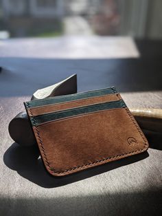 100% handcrafted sharkskin minimalist wallet.  This bad boy has a uniquely textured real sharkskin outer shell with luxury full grain Italian Pueblo liner.  The quality of this leather is just phenomenal and sustainably tanned using a vegetable tanning process rather than a chemical process!  The stitching was all done by hand with premium Fil Au Chinois linen thread that has been hand waxed is incredibly strong.  This wallet has 3 card pockets and a cash slot in the back. This wallet was sustai Linen Thread, Hand Wax, American Leather, Gifts For My Wife, Minimalist Wallet, Money Clip Wallet, Bad Boy, High Quality Leather, Full Grain Leather