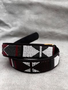 The Belts are made from ethically sourced leather in Kenya. The collars are then hand beaded by Maasai women artisans from my Village in Kajiado who have mastered the art. The hardware is made from 100% recycled brass. TO MEASURE CORRECTLY If you know your pants waist size, you can follow the add-two-inches rule i.e if your pants waist measurement is 32 Inches, then your belt size will be 34-36 Inch Belt. Our measurements are from the tip of the Buckle of the Belt to the second hole after the be Handmade Belt, Boho Belt, Boho Belts, Belt Men, Handmade Belts, Small Bracelets, Beautiful Belts, Belt Leather, Beaded Belt