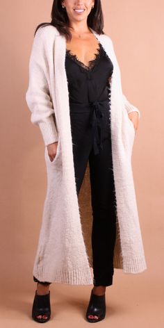 Cozy Long Sweater Cardigan with Pockets. Features a Soft & Fluffy Mohair Knit. 50% Acrylic | 29% Viscose | 12% Nylon | 9% Mohair Made in Italy One Size Model 5'7" Cozy Long Cream Outerwear, Cozy Long Cardigan For Cold Weather, Winter Cream Sweater Coat For Layering, Cream Sweater Coat For Winter Layering, Cream Cardigan For Winter Layering, Cream Open Front Sweater Coat For Winter, Winter Cream Cardigan For Layering, Winter Cream Soft Knit Cardigan, Winter Open Front Cream Sweater