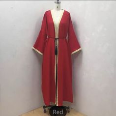 Beautiful Red For The Coming Season Red Long Thobe For Eid, Elegant Long Sleeve Red Abaya, Elegant Red Long Sleeve Abaya, Elegant Red Floor-length Abaya, Elegant Long Red Robe, Elegant Red V-neck Kaftan, Red Long Sleeve Spring Robe, Elegant Red Long Sleeve Thobe, Red Kaftan For Eid