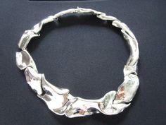 "This is a Gorgeous Vintage J Joanne Cooper For CINER Mirror Polished Finish Silver Tone Metal Modernist Sculptural Segmented Panel Links Necklace Brutalist Style Jewelry There is some minor/light signs of wear to the silver plating finish very light scratches, but otherwise in very good vintage condition beautiful clean and ready to wear!. Signed Ciner J Joanne Cooper. Push clasp release. Measures approx. 15-1/2\" in length. Tapered width 1/2\" to 1\". Segmented sections. For more brand names o Futuristic Jewelry, Vintage Modernist Jewelry, Givenchy Earrings, Ring Stacks, Liquid Silver, Vintage Givenchy, Modernist Jewelry, Gold Chain Jewelry, Filigree Design