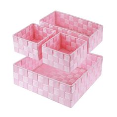 three pink storage boxes stacked on top of each other in the shape of cubes