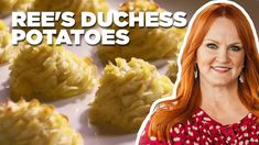 a woman with red hair standing in front of some potato patties on a white plate