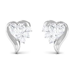 Product Details A gleaming heart shaped diamond takes all the limelight in these stud earrings that are a dream of every minimalistic. Complemented by round diamond on one side and a luminous semi-heart motif on the other, the stud earrings are a refreshing twist on the classic heart design. The diamond is prong set for a striking look that captures the eye effortlessly. Comes with screw back findings for a comfortable fit. Product Information SKU SHP-EARRINGS022210334 Length 8 mm Width 6.5 mm Height 2.5 mm Weight 1.12 gm (Approximate) DIAMOND INFORMATION No.of Stones 8 Pieces Total Weight 0.69 Carat (Approximate) Dimension(approx) Heart-4X4 mm-2 PcsRound-1.50X1.50 mm-6 Pcs Color HI Cut Brilliant Shape Heart, Round Setting Type Prong-Setting Quality Grade SI View More Product Parent Collec Heart Shaped Diamond, Diamond Heart, Quality Diamonds, Diamond Earrings Studs, Heart Design, Heart Shape, Round Diamond, Prong Setting, A Dream