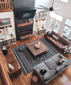 Snowbound and tricorn black Multicolor Living Room Rug, Ranch Theme Living Room, Leather Couch Beach House, Rustic Sectional Sofa, Chelsea Houska Home Decor, Black And Brown Western Living Room, Western Farmhouse Interior, Western Living Room With Fireplace, Things To Do With Slabs Of Wood