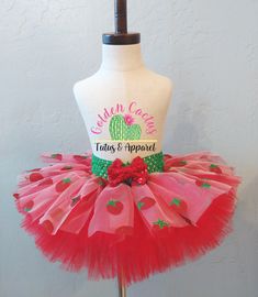 This sweet tutu is perfect for summertime! Strawberry print tulle sits on top of red tulle and a green waistband. Add a sparkly red or green bow for an additional $2. Sizing info: All tutus are made with a soft, stretchy waist band. 0-6 months is approx 4 inches long. 6 months to 2T is approx 6 inches long. 3-5T is approx 8 inches long. 6-8T is approx 10 inches long. Fitted Green Tulle Tutu Dress, Christmas Tulle Tutu Dress For Dress-up, Red Tutu Skirt For Kids, Red Christmas Tutu Dress For Dress-up, Green Tutu, Halloween Pajamas, Tulle Tutu, Strawberry Print, Tutu Costumes