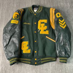 Vintage 2000s Butwin Chicago Lakes High School Stitched Embroidered Y2K Aesthetic Streetwear Green Button Up Varsity Jacket Large Women Condition:  Excellent Used Condition  = No Flaws Measurements: Please see photos above for all measurements IF YOU BUY TWO OR MORE ITEMS USE THE CODE BUNDLE @ CHECK TO SAVE 20% WE SHIP WITHIN 24 HOURS AFTER PURCHASE! Please be aware that we do not offer free returns!! The Buyer is responsible for the cost of the return label.  Follow us on TikTok & Instagram @findsnostalgic and tag us in your finds Fitted Outerwear With Button Closure For College, Embroidered Hooded Varsity Jacket For College, Fitted Varsity Jacket With Button Closure For College, 90s Style Cotton Outerwear For College, Fitted Outerwear With Pockets For College, Retro Embroidered Varsity Jacket For Fall, Embroidered Retro Varsity Jacket For Fall, Varsity Fitted Outerwear For College, Varsity Style Fitted Outerwear For College