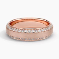 a rose gold wedding band with diamonds