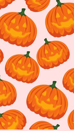 an orange pumpkin pattern on a pink background