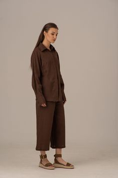 "Vintage Style Linen Shirt, Chocolate Brown Top, Dropped Shoulders Blouse ABOUT THE SHIRT: * Dividing seams offset to the front * High back side seam slits * Dropped shoulders * High-quality linen fabric * Full-length button placket * Long sleeves with cuffs * The Shirt is perfect for every occasion, office *CARE* Gentle hand wash 30oC *COLORS* Please, always remember that colors of images may look a bit different because of the specifics of your monitor's settings. Model is wearing size S. She Casual Long Sleeve Blouse With Set-in Sleeves, Brown Relaxed Fit Shirt For Work, Brown Linen Long Sleeve Blouse, Brown Buttoned Shirt For Daywear, Linen Blouse With Button Cuffs For Work, Brown Shirt With Buttons For Daywear, Classic Brown Blouse With Button Cuffs, Brown Collared Blouse With Relaxed Fit, Brown Relaxed Fit Collared Blouse