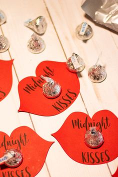 valentine's day candy kisses are arranged on a table