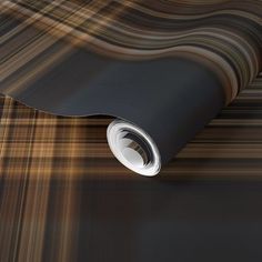 a black and brown wallpaper with an abstract design on it's side,