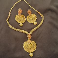 Never Worn Ethnic Necklace Set In Antique Gold Finish Which Comes With Earrings Which Can Just Be Worn As Statement Earrings. Neutral Colors Which Goes With Any Outfit. Has Dori In The Back To Adjust The Length Of The Necklace. Sfpf Home. Gold Bohemian Jewelry Sets For Festive Occasions, Bohemian Gold Jewelry Sets For Festive Occasions, Gold Bohemian Bridal Necklace With Latkans, Bohemian Gold Jewelry Sets With Matching Earrings, Bohemian Gold Jewelry Sets For Festivals, Gold Chandbali Bridal Necklace In Bohemian Style, Bohemian Gold Kundan Necklace With Intricate Design, Bohemian Gold Jewelry For Diwali, Gold Bohemian Bridal Necklace For Celebration