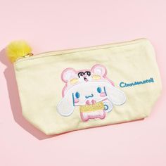 Use this super cute mini pouch to store your cosmetics and other trinkets! It features a cute embroidery of Cinnamoroll dressed as a bear. This pouch even has a printed inner lining and pockets for sorting your stuff. Cute Pouch Pencil Case For Daily Use, Cute Daily Use Pouch Pencil Case, Cute Daily Use Pencil Case Pouch, Cute Zipper Pouch Cosmetic Bag, Cute Personal Zipper Pouch, Cute Zipper Pouch For Personal Use, Cute Cosmetic Bag With Zipper Pouch, Kawaii Bags, Mini Pouches