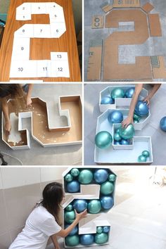 several different pictures of letters made out of cardboard and some blue balls on the floor