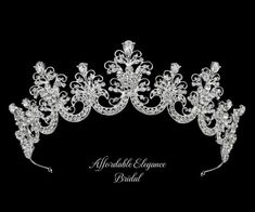 a tiara with crystal stones and pearls on the headpiece is shown in this black background