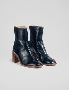 These versatile ankle boots from LK Bennett will see you through the colder months in style. They're designed with a grained leather upper, featuring a front seam detail and a modern square toe. The mid-height block heel gives a little extra lift while ensuring comfy all-day wear.  At the back heel, the zip fastening is finished with a gleaming gold-tone pull. Square Toe Ankle Boots, Dress Flip Flops, Lk Bennett, Shoes Flats Sandals, Sun With Sunglasses, Adidas Shop, Leather Block Heels, Modern Square, Wedding Guest Dress Summer