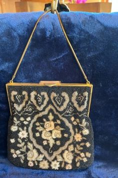 "Vintage Beaded Purse -black, silver, white and pink beads with gold and mother of pearl claps Lining in good condition with minor lipstick stain at top and pen marks at bottom as well as mild water stain. Solid bead coverage with lovely flower designs Beads are in excellent condition with one strand loose thread easily could be tacked down measures 7\"x6.6\" Unique and lovely vintage evening purse" Antique Beaded Jewelry For Evening, Vintage Black Beads Jewelry For Evening, Vintage Embellished Jewelry For Formal Occasions, Vintage Black Beaded Jewelry For Evening, Vintage Rectangular Bag With Pearl Embroidery, Vintage Black Embellished Bags, Luxury Vintage Beaded Evening Bag, Vintage White Beaded Clutch, Vintage Black Beaded Evening Bag