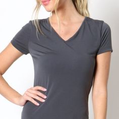 Gray Short Sleeve V-Neck Tee In Spandex Jersey Body Length 24 1/2" , Chest 30 Measured From Small Fabric 95% Polyester 5%Spandex Solid V-neck Athleisure Top, Solid Color Fitted V-neck T-shirt, Solid V-neck Fitted T-shirt, Fitted V-neck Top For Workout, Fitted V-neck T-shirt In Elastane, Elastane V-neck Yoga Tops, V-neck Elastane Tops For Yoga, V-neck Elastane Yoga Tops, Fitted Elastane V-neck T-shirt