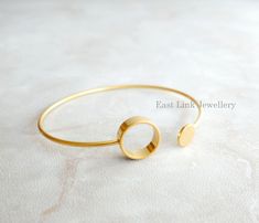 Fashion simple geometry bangle Length, 6.2cm in diameter Adjustable Modern Bangle, Modern Adjustable Round Bangle, Modern Adjustable Hoop Cuff Bracelet, Modern Metal Round Cuff Bracelet, Modern Round Metal Cuff Bracelet, Gold Hoop Bangle In Minimalist Style, Minimalist Gold Hoop Bangle, Minimalist Hoop Bangle As Gift, Metal Hoop Bangle As A Gift