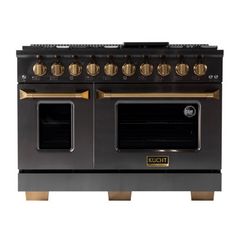 a black and gold stove with two ovens