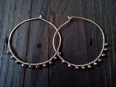 "Beautiful silver plated Swarovski seed crystals in these hoop earrings which i made with 18g. German silver wire or 18g. 925 Silver wire. You can choose from the menu if you want German silver hoops or 925 silver hoops. The polygon shape and the natural flash that is characteristic of crystals can be seen in each dangle. Super light weight. Perfect for the bohemian bride or for bridesmaids gift. Elegant hoop earrings for your bridesmaid girls. German silver called and Alpaka in Greek language, Silver Beaded Hoop Earrings As Gift, Hoop Silver Bead Jewelry Gift, Hoop Silver Beads Jewelry Gift, Silver Beads Hoop Jewelry For Gift, Nickel-free Metal Hoop Earrings For Wedding, Hoop Earrings With Silver Beads, Silver Metal Small Hoop Crystal Earrings, Handmade Silver Crystal Hoop Earrings, Silver Metal Hoop Crystal Earrings