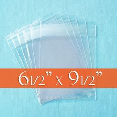 five clear plastic bags are shown on a blue background