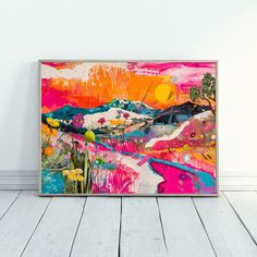 an abstract painting is displayed on the wall in front of a wooden floor and white walls