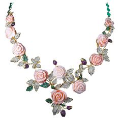 The Following Item we are offering is a Rare Important Radiant White Gold Large Fancy Coral, Emerald, Sapphire Diamond Necklace. Necklace is comprised of a Gorgeous Fancy Carved Coral Carved Flowers adorned with Exquisite Rare Glittering, Sapphires, Emeralds, and Diamonds forming leaves. T.C.W OVER 150CTS!!! Comes with New with Tags from a Private Manufacturer that sells to Important 5 Star Hotel and Fine Jewelry Stores. Original Retail Price: $65,000.00!!! A Rare Gorgeous Masterpiece!!! Luxury Flower-shaped Evening Jewelry, Luxury Flower-shaped Jewelry For Evening, Luxury Flower Jewelry For Evening, Elegant Flower Necklaces For Evening, Elegant Flower Necklace For Evening, Sapphire Diamond Necklace, Coral Roses, Sapphire And Diamond Earrings, Big Diamond