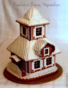 a gingerbread house is shown on a white background