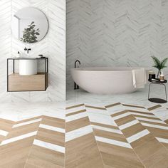 a bathroom with white walls and wood flooring in the middle, an oval mirror on the wall next to a bathtub