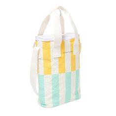 a white and yellow striped bag on a white background with the words, somewhere in it