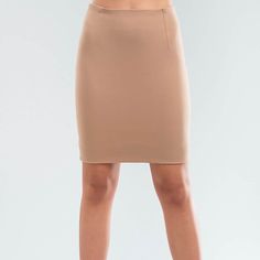 Short skirt in viscose knit. This skirt is extremely sophisticated thanks to its minimal cut and knee length. High-waisted, the skirt has a rigid band at the front and a practical zip at the back. The back vent makes it easy to wear in everyday life. The jersey fabric is comfortable and soft against the skin, resistant to multiple washes and long-lasting. TECHNICAL INFORMATION Sartorial product Composition: Viscose 68%, Polyamide 27%, Elastane 5% Washing machine: 30o Dryer: Low Temperatures Iron Sleek Knee-length Lined Skirt, Chic Elastane Mini Pencil Skirt, Chic Mini Pencil Skirt, Modern Knee-length Fitted Skirt, Modern Fitted Knee-length Skirt, Sleek Fitted Elastane Skirt, Sleek Knee-length Lined Pencil Skirt, Sleek Knee-length Elastane Skirt, Sleek Stretch Pencil Skirt For Spring