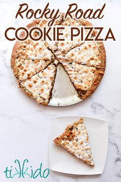 a piece of rocky road cookie pizza on a white plate next to a slice cut out