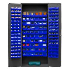 a large storage cabinet filled with lots of blue bins