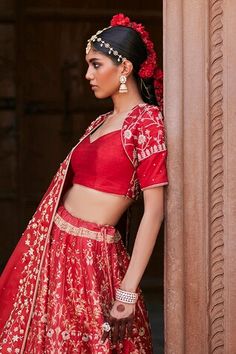 Scarlet red flared katan silk banarasi kali lehenga with all over rafflesia garden zardozi embroidery in golden accents. Paired with half sleeves Queen Anne neckline jacket style padded blouse with intricate zardozi florence vine embroidery on the back, sleeves and organza dupatta adorned with hand embroidered zardozi borders and ornate boota motifs spread throughout. - Aza Fashions Red Festive Choli, Fitted Choli For Transitional Season, Fitted Lehenga With Motifs, Traditional Wear With Zari Work For Ceremonies, Ceremonial Fitted Choli, Red Festive Traditional Wear For Ceremonies, Ceremonial Sets For Festive Occasions, Ceremonial Fitted Lehenga With Motifs, Ceremonial Sets With Unstitched Blouse