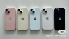 four iphones are lined up in different colors