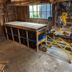 a workbench in a garage with lots of tools