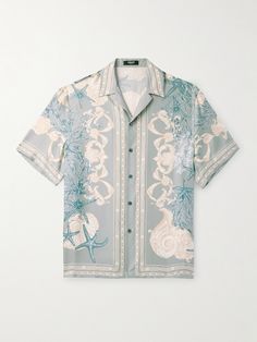 It's hard to ignore the siren call of Versace's 'Barocco Sea' camp-collar shirt. It's been cut in Italy from smooth silk-twill and printed with shells, corals and starfish in the house's signature ornate style. Wear yours with the matching shorts for the full effect. Fashion Shirts Men, Luxury Polo Shirt, Resort Wear Men, Rare Rabbit, Silk Shirt Men, Siren Call, Camp Collar Shirt, The Siren, Resort Shirt