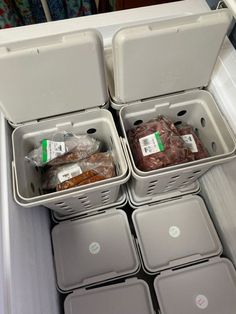 the coolers are filled with food and ready to be put into the freezer