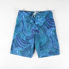 Awesome 100% cotton paisley printed shorts by Spartacus. Made in Canada. Drawstring waist with zipper fly. High waist fit. Adult small, modern US size 2...26" waist. Great condition. Paisley Print Blue Bottoms For Vacation, Blue Paisley Print Bottoms For Vacation, Printed Cotton Beachwear Bottoms, Blue Paisley Print Casual Bottoms, Beach Paisley Print Cotton Bottoms, Printed Cotton Swim Trunks, Paisley Print Shorts For Beach, Paisley Print Beach Shorts, Paisley Print Short Beach Bottoms