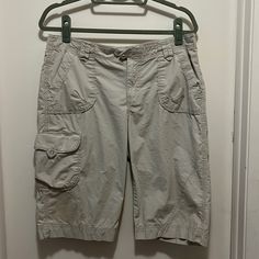 Long Khaki Cargo Shorts; Great For Hiking Size 10 See Photos For Signs Of Wear As There Are 2 Slight Stains Near Bottom Of Each Leg. Never Worn! Questions? Leave A Comment Below! Spring Cargo Shorts For Outdoor Activities, Spring Pants For Outdoor Activities, Short Length, Short Pants For Outdoor Activities In Spring, Casual Short Capris With Pockets, Casual Short Length Capris With Pockets, Casual Short-length Capris With Pockets, Casual Capris With Built-in Shorts, Casual Capris With Built-in Shorts For Spring, Sporty Capris With Pockets For Summer