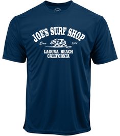 The Joe's Surf Shop California Graphic Workout Tee is an essential addition to your workout clothing collection. This moisture wicking tee is made of the softest polyester that gives you an ultra comfortable feel. Our best selling Fins Up logo was designed in Laguna Beach, CA. 3.8-ounce, 100% polyester Moisture wicking Lightweight and breathable Set-in sleeves Free shipping on orders $65+ Navy Sports T-shirt With Team Name, Moisture-wicking Dri-fit Activewear, Navy Sports T-shirt With Letter Print, Functional Dri-fit Crew Neck T-shirt, Sports Season Dri-fit T-shirt With Letter Print, Dri-fit T-shirt With Letter Print For Sports Season, Sportswear Dri-fit T-shirt With Graphic Print, Moisture-wicking Crew Neck T-shirt With Comfortable Fit, Moisture-wicking Dri-fit T-shirt With Crew Neck