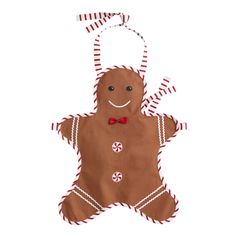 a ginger ornament hanging from a string on a white background with red and white stripes