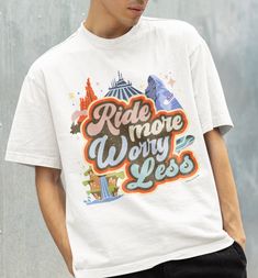 "Looking for the perfect tee for your next trip to Disneyland? This vintage style Disneyland t-shirt is sure to be a hit! Featuring the words \"Ride More, Worry Less\" and graphics of classic rides including Space Mountain, Thunder Mountain, Matterhorn, Monorail, and Splash Mountain, this distressed t-shirt is the perfect way to remember all the fun you had at the happiest place on earth. The comfortable, relaxed fit makes it perfect for a day at the park or just lounging around at home. Get you Disney Shirts Old Scholl, Retro Disneyland Resort Shirt, Cute Disney Shirts, Disney Luggage, Disneyland Shirt, Disneyland Rides, Thunder Mountain, Trip To Disneyland, Disney Trip Shirts