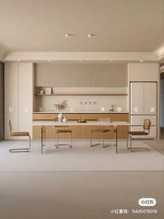 an empty kitchen with two chairs and a table in front of the counter top area